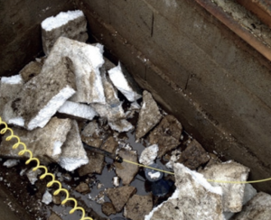 Passage de sonde émettrice dans une canalisation